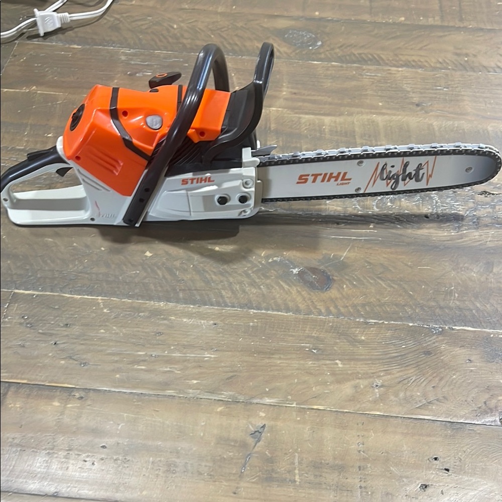 Stihl Orange and White Toy Chainsaw